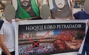 “28 Mall”un qarşısında plakat açan təriqət üzvləri həbs edildi - FOTO